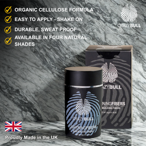 Crazy Bull lightning hair building fibers can and packaging on a marble background