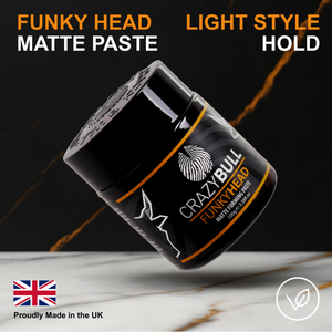 Crazy Bull Funky Head matte paste jar on a marble surface with a dark background